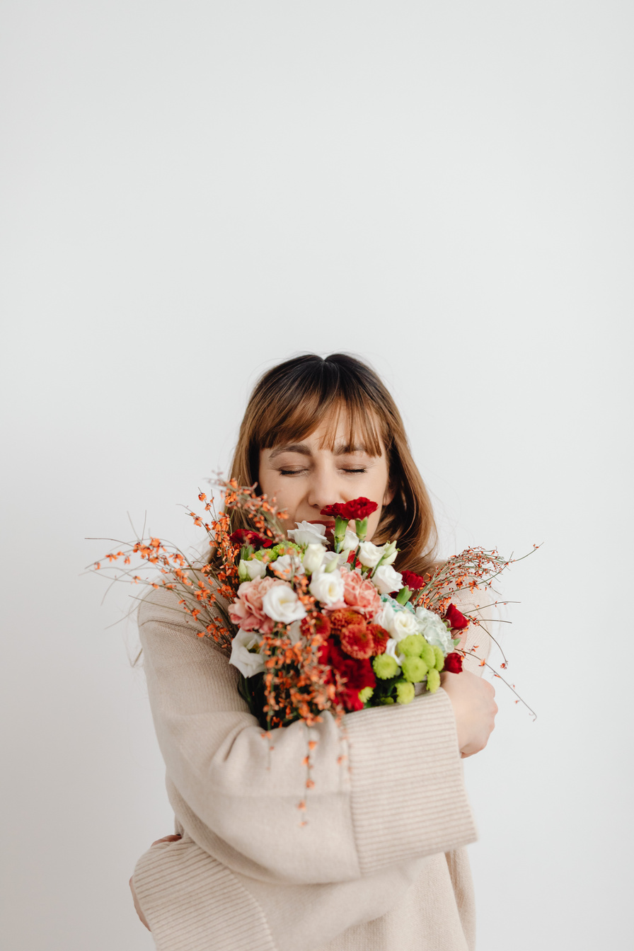 Woman Hugging Flowers